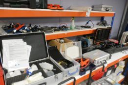 Loose contents of two workbenches to include inspection equipment, hand tools, Snail commercial iron