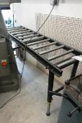 Axminster adjustable gravity roll in/out feed section dimension: 1800 x 400mm (Please note, This lot