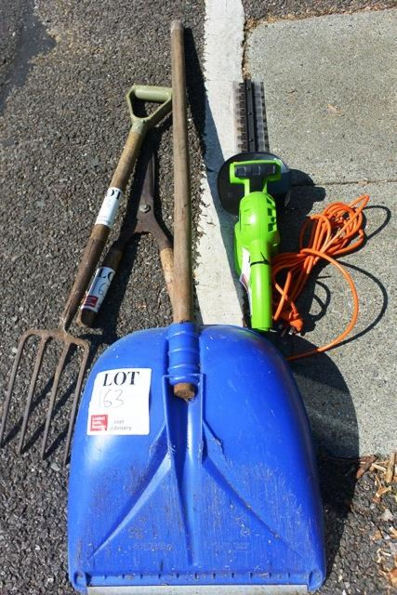 Assorted garden tools to include hedge trimmer, pitchfork, shears, (Please note, This lot must be