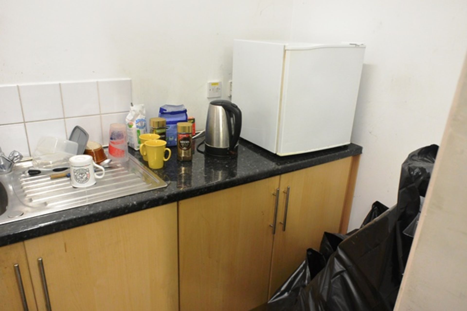 Loose contents of kitchen/canteen to include Beko freezer, Thorn bench top fridge, kettle and