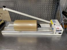MEC shrink wrap sealer and roll of wrap, model 800IP