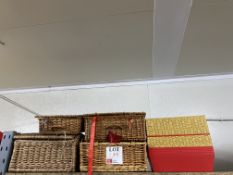 Four wicker baskets, to include assorted trays