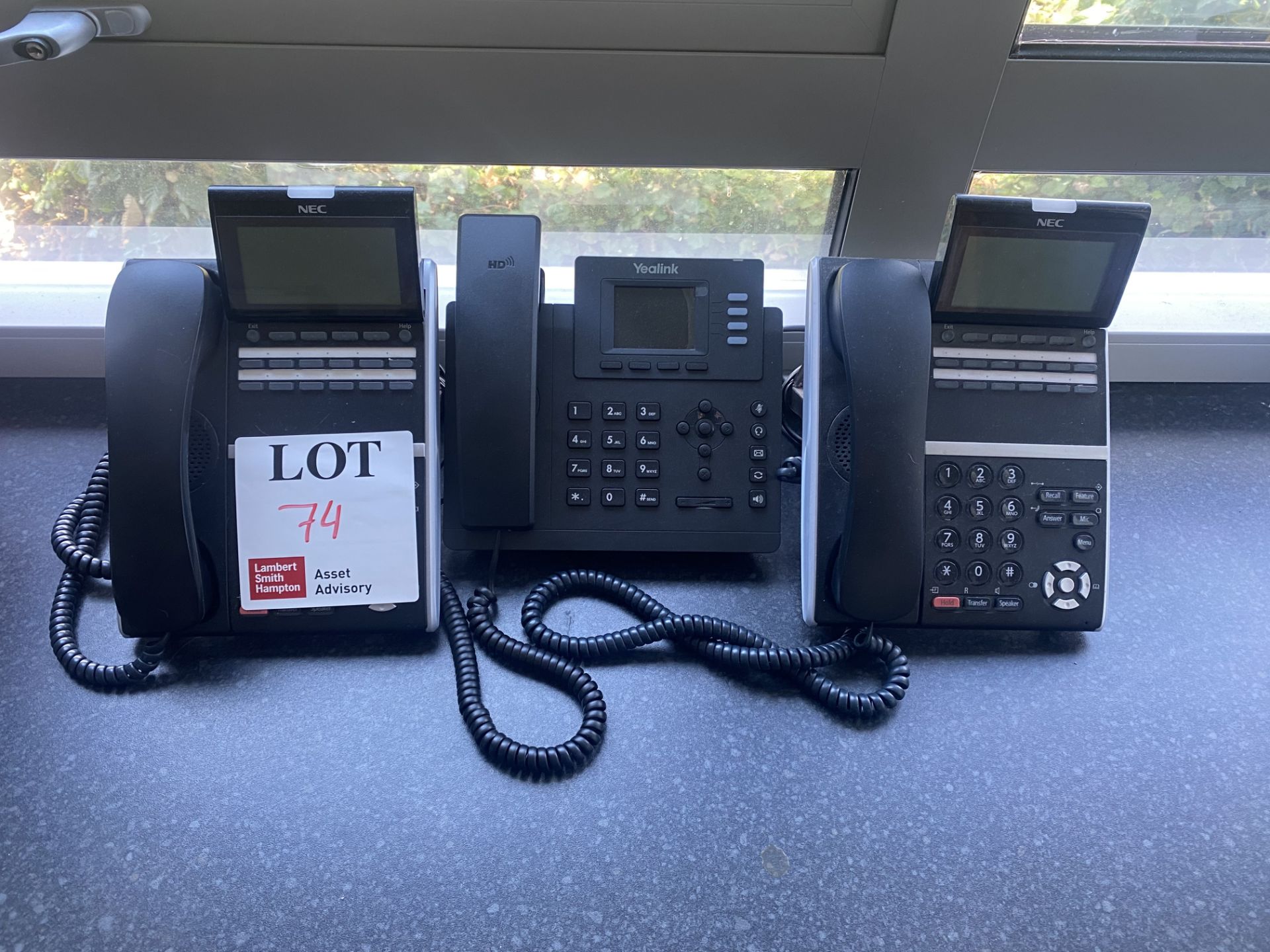 3 Desktop office phones (2 NEC and 1 Yealink)