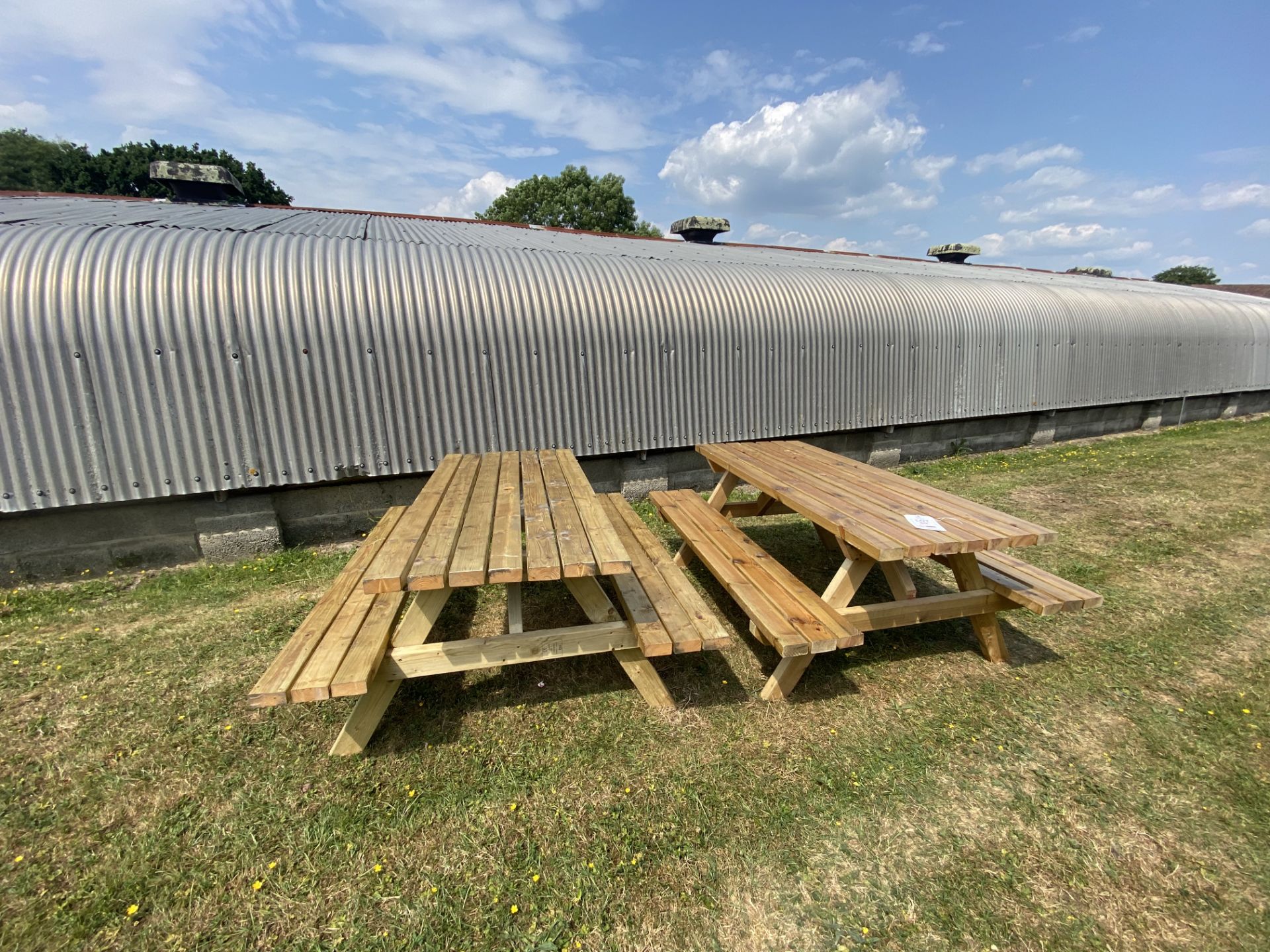 Two wooden garden benches, approx 180 x 140 x 74cm