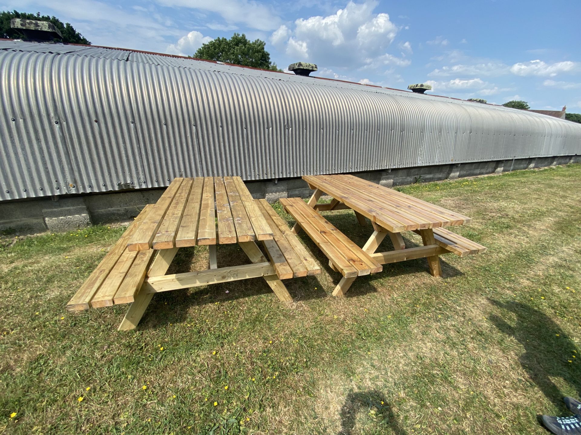 Two wooden garden benches, approx 180 x 140 x 74cm