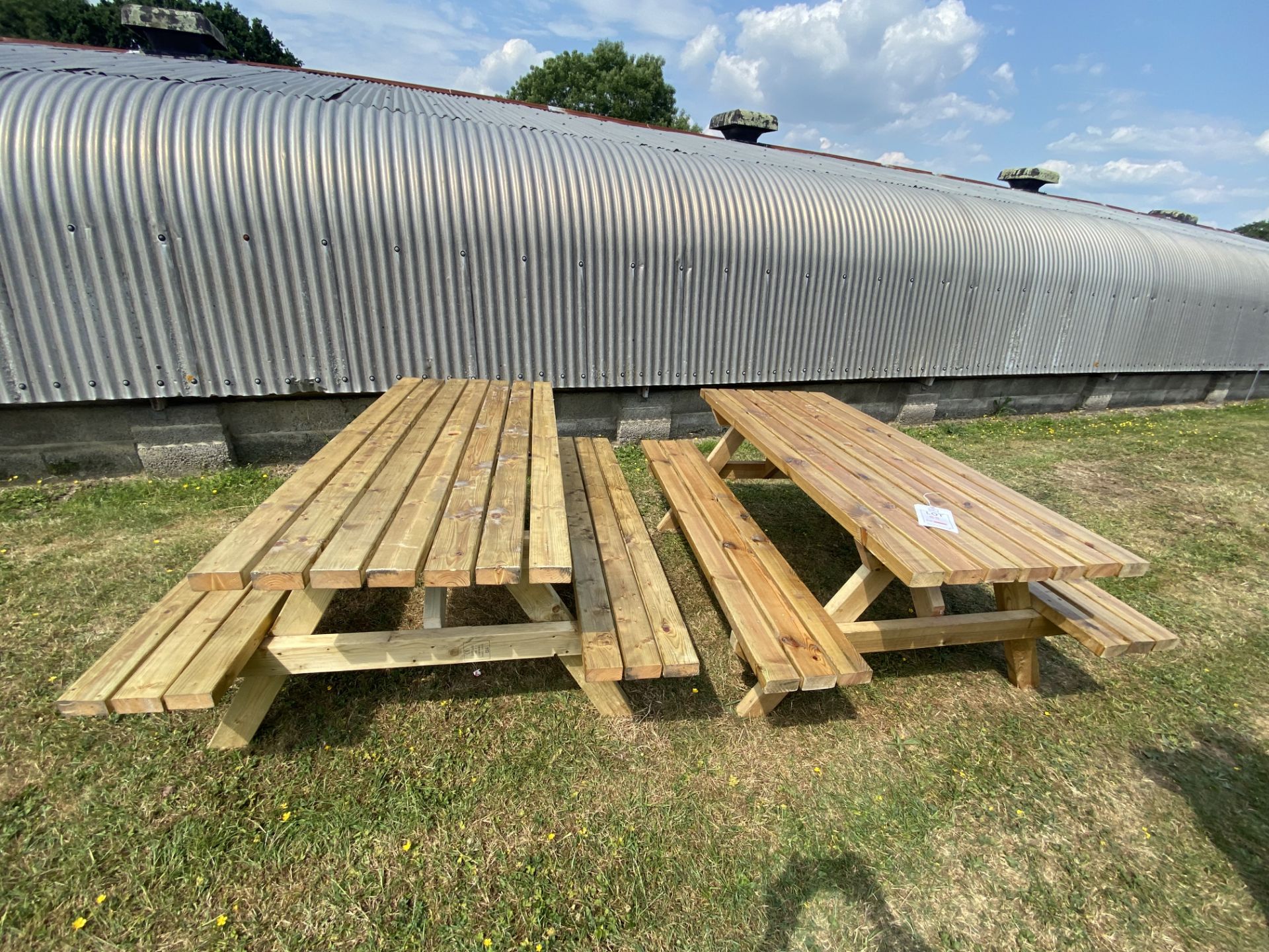 Two wooden garden benches, approx 180 x 140 x 74cm