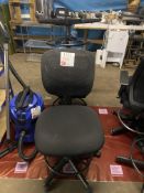 Three upholstered office chairs