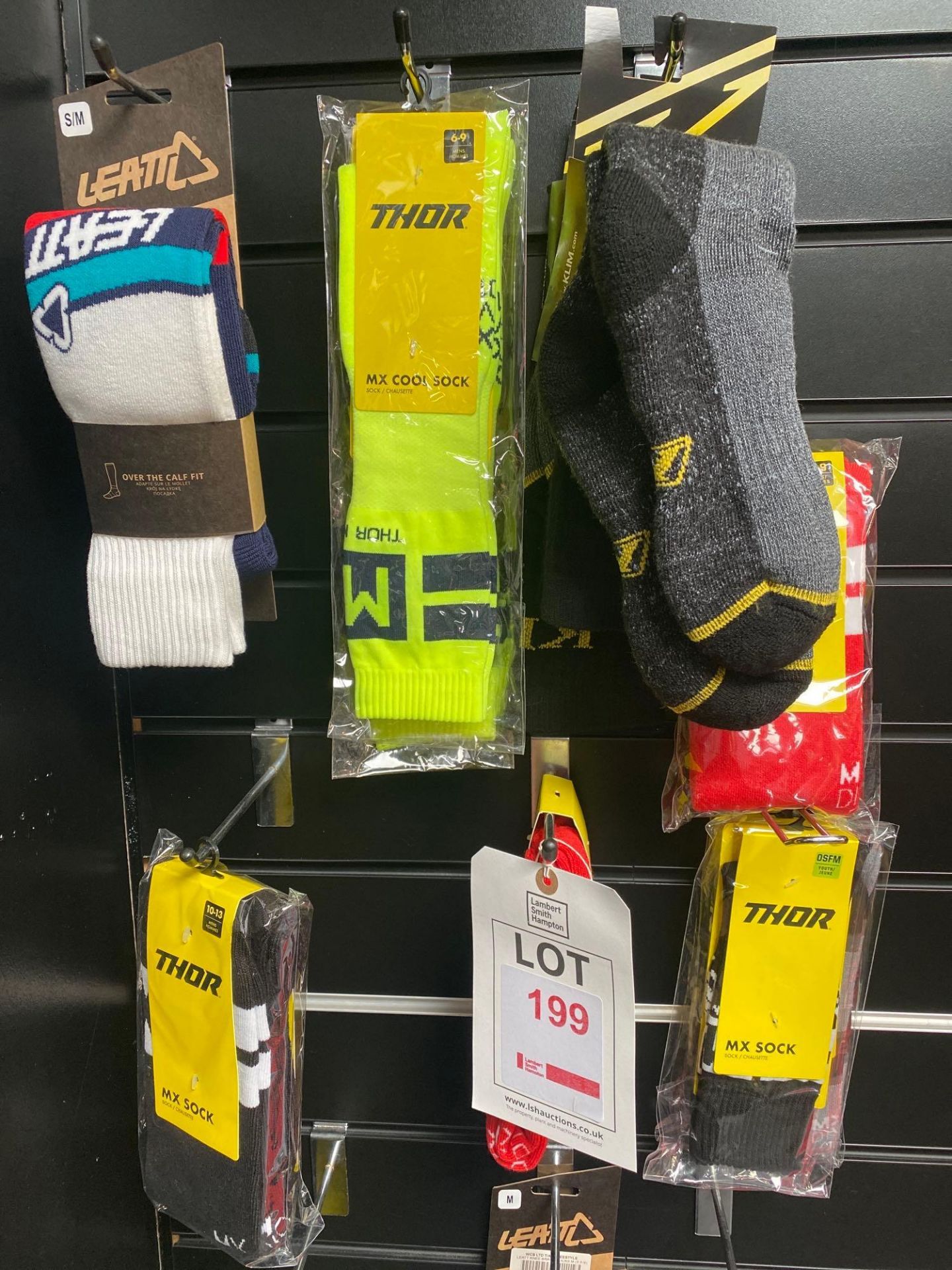 Various Thor and Leatt branded socks, complete with 3 Arma waterproof over jackets - Image 2 of 4