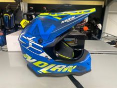 Nolan N53 motocross helmet size XS. Please note this lot will be sold as Zero Rated VAT
