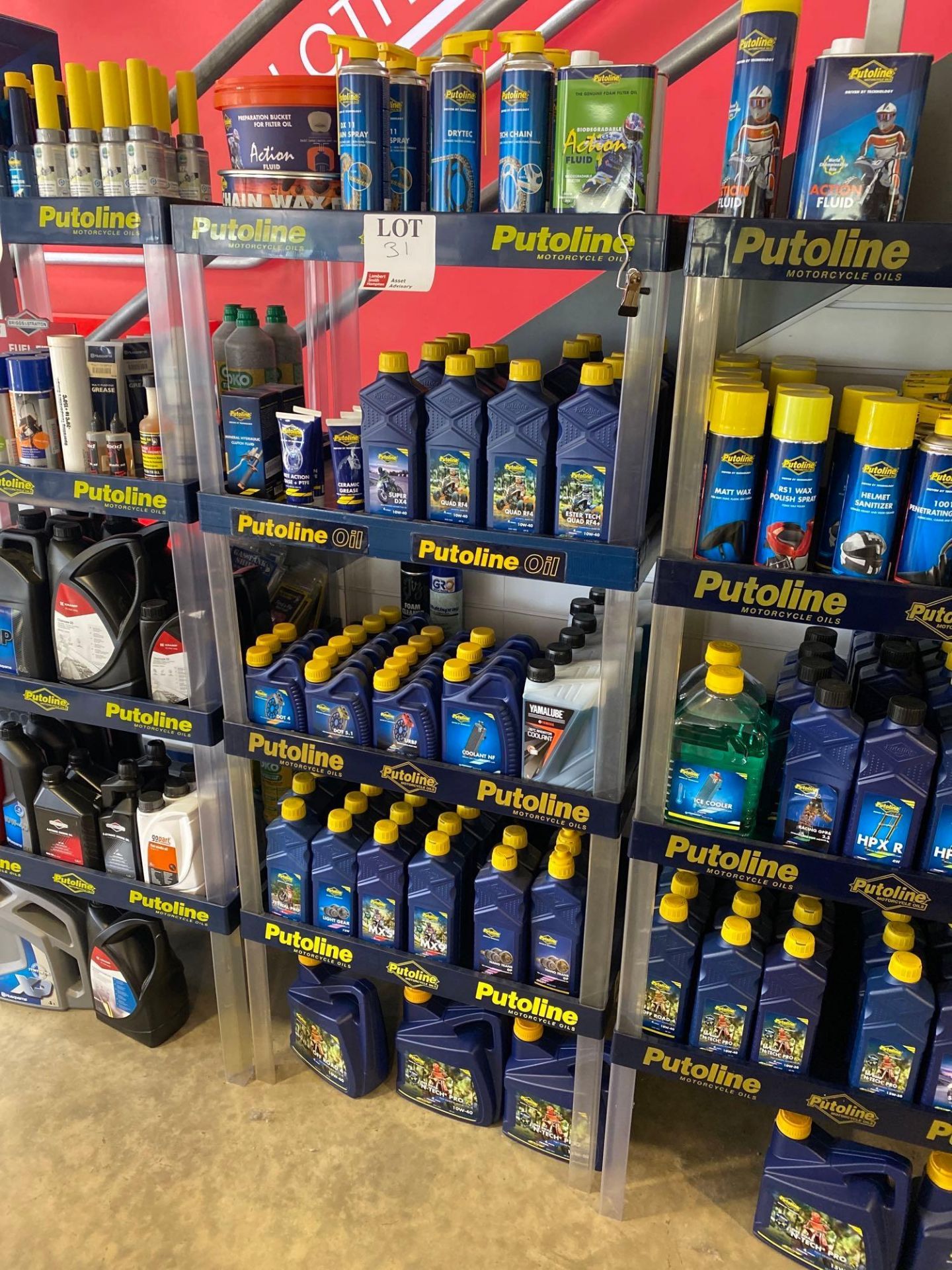 Putoline display unit and contents to include various unused, lubricants, sprays and oils as lotted