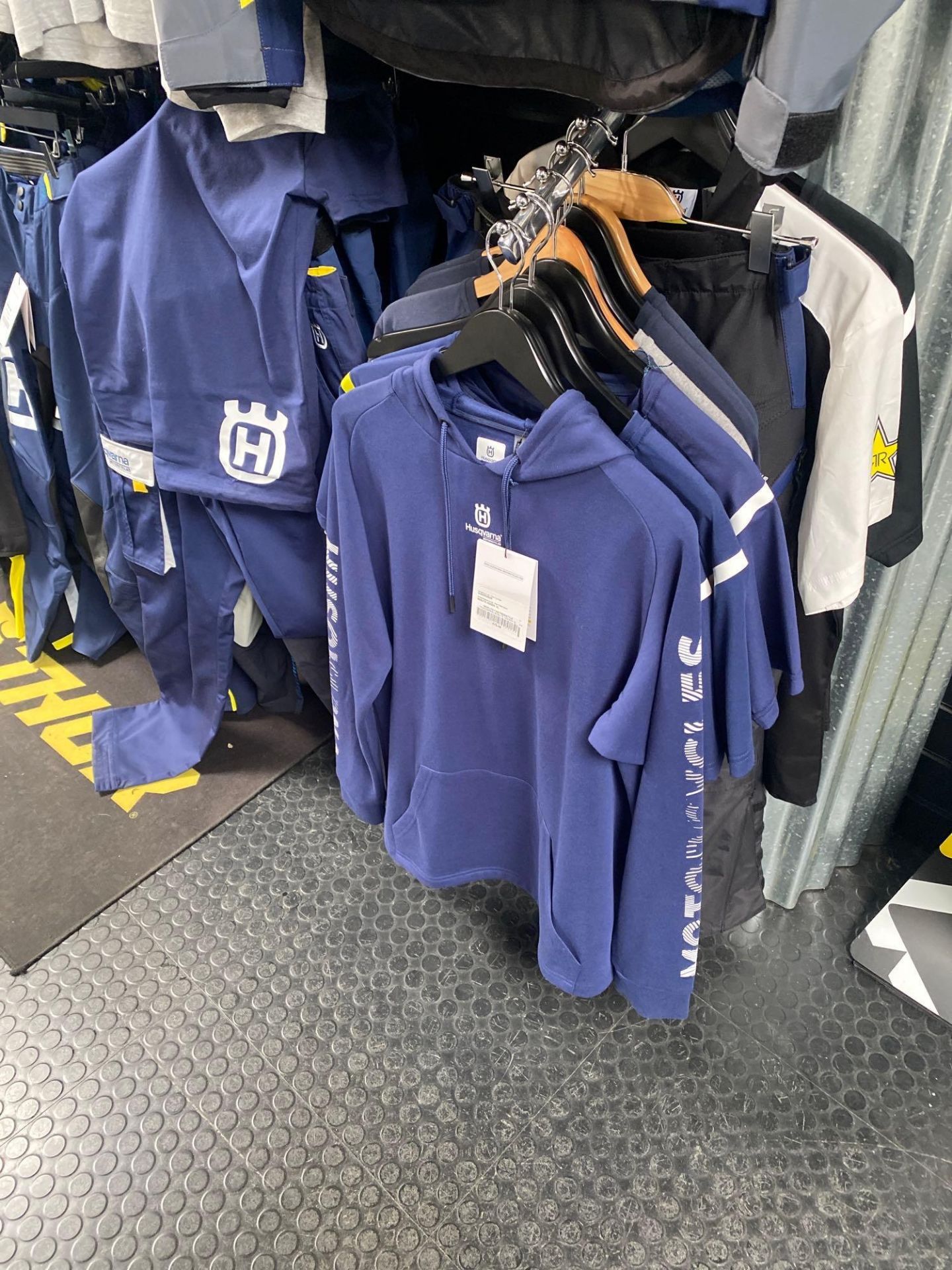 Large quantities of Husqvarna branded clothing as lotted - Image 5 of 7