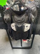 Leatt body protector, black and white size 4.5, RRP £215.00.
