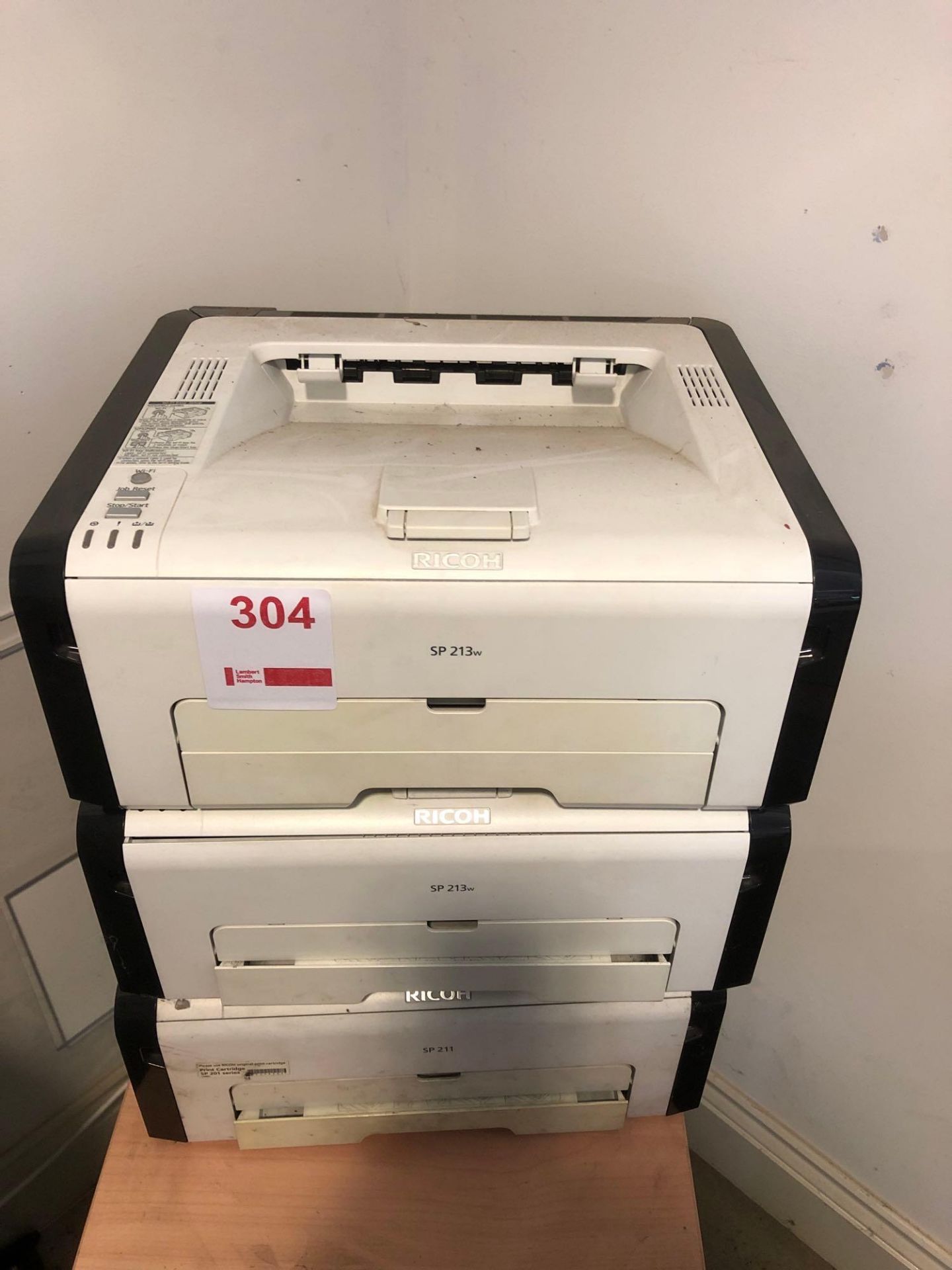 Two Ricoh SP213W Wireless Laser Printers and a Ricoh SP211 laser Printer (No Power Supplies)