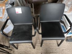 Two Pedrali black plastic stackable chairs (Located: Billericay)