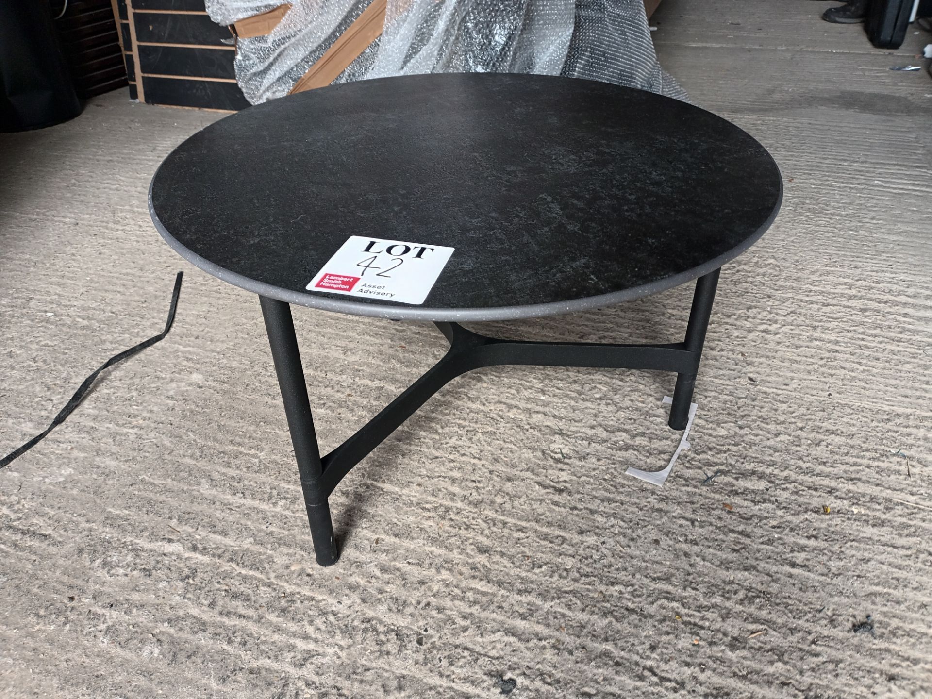 Dekton circular stone coffee table with three leg base (Located: Billericay)