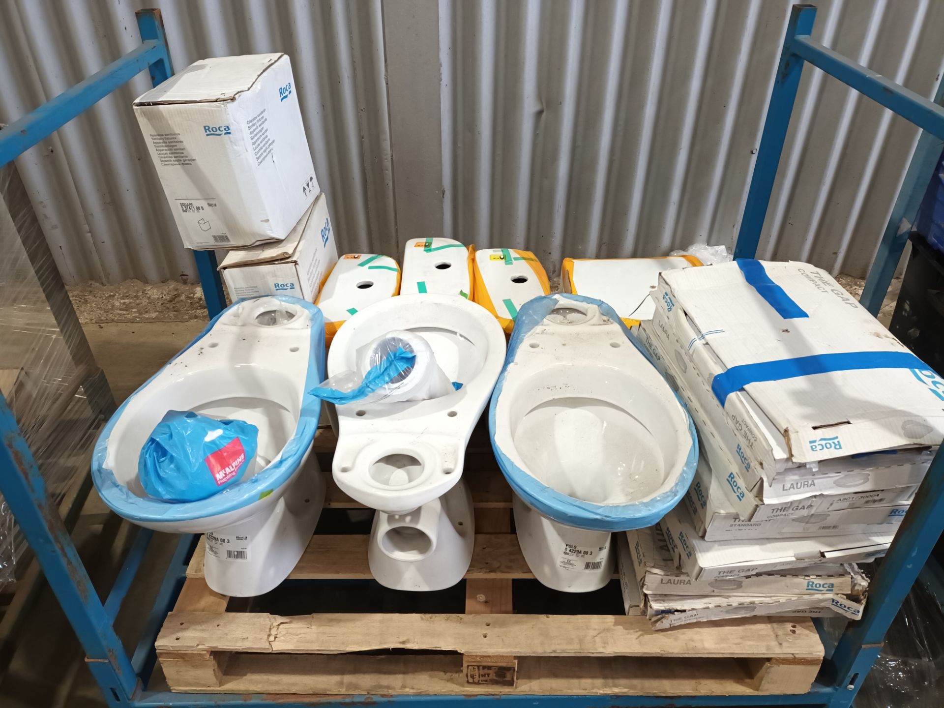 Three pallets comprising a quantity of various Roca sanitary fixtures (Located: Hanslope)
