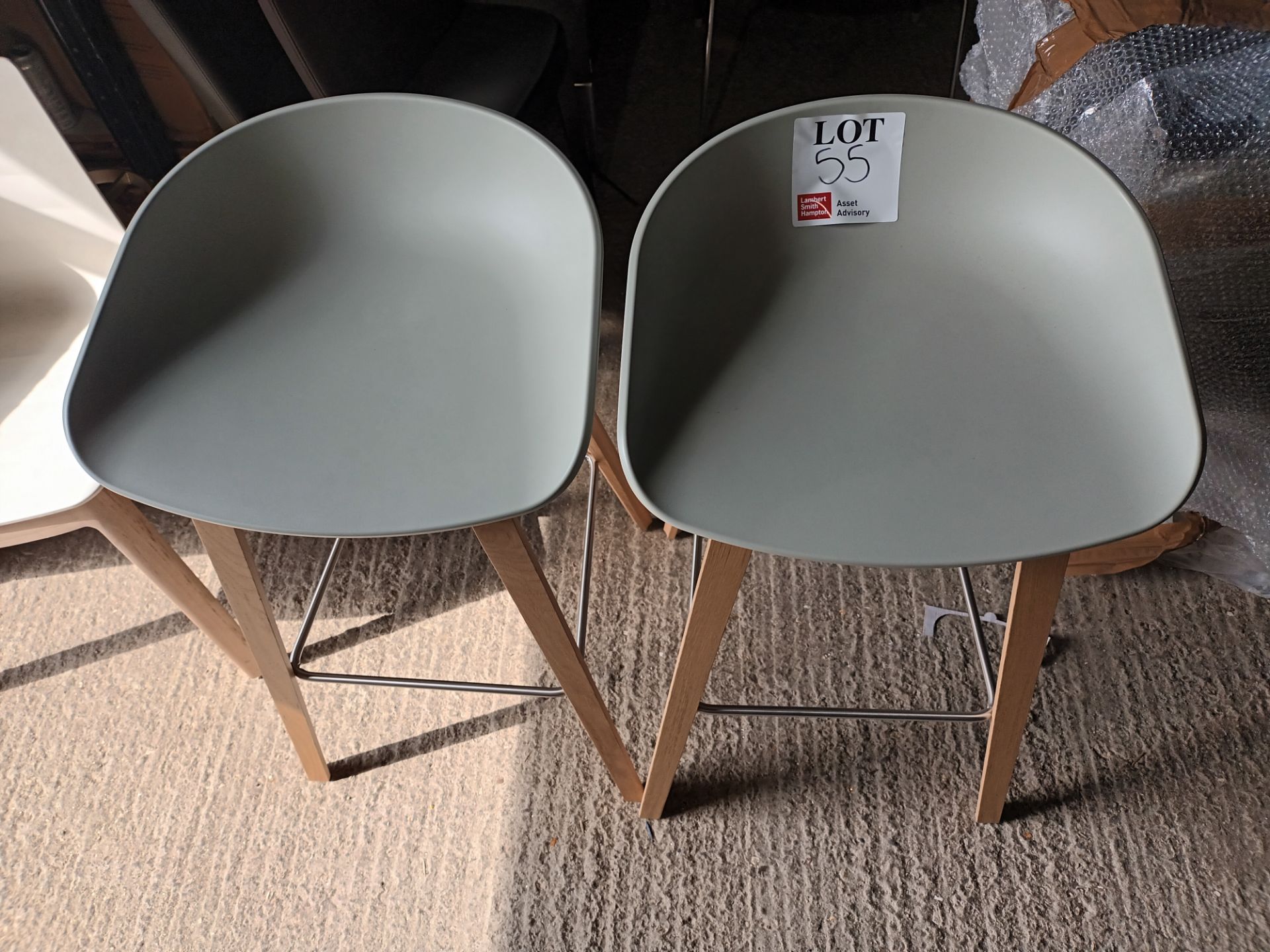 Two HAY blue light blue low back high stools with wood legs (Located: Billericay)