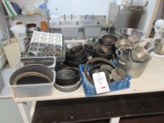 Quantity of assorted pots, pans, cake tins, bowls, chopping boards, measuring jugs, terracotta