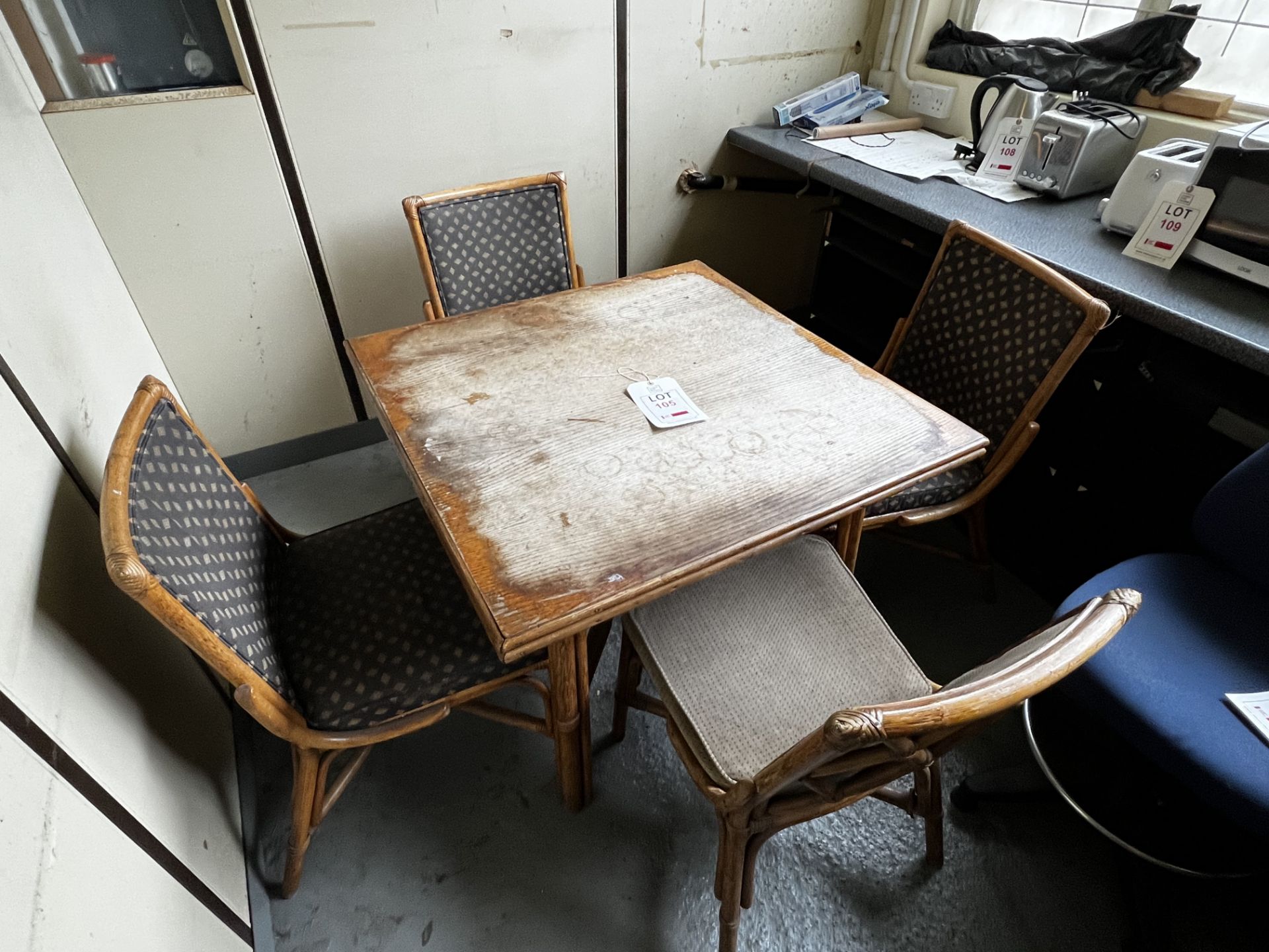 Cane table and four chairs (this lot is located at Portreath)