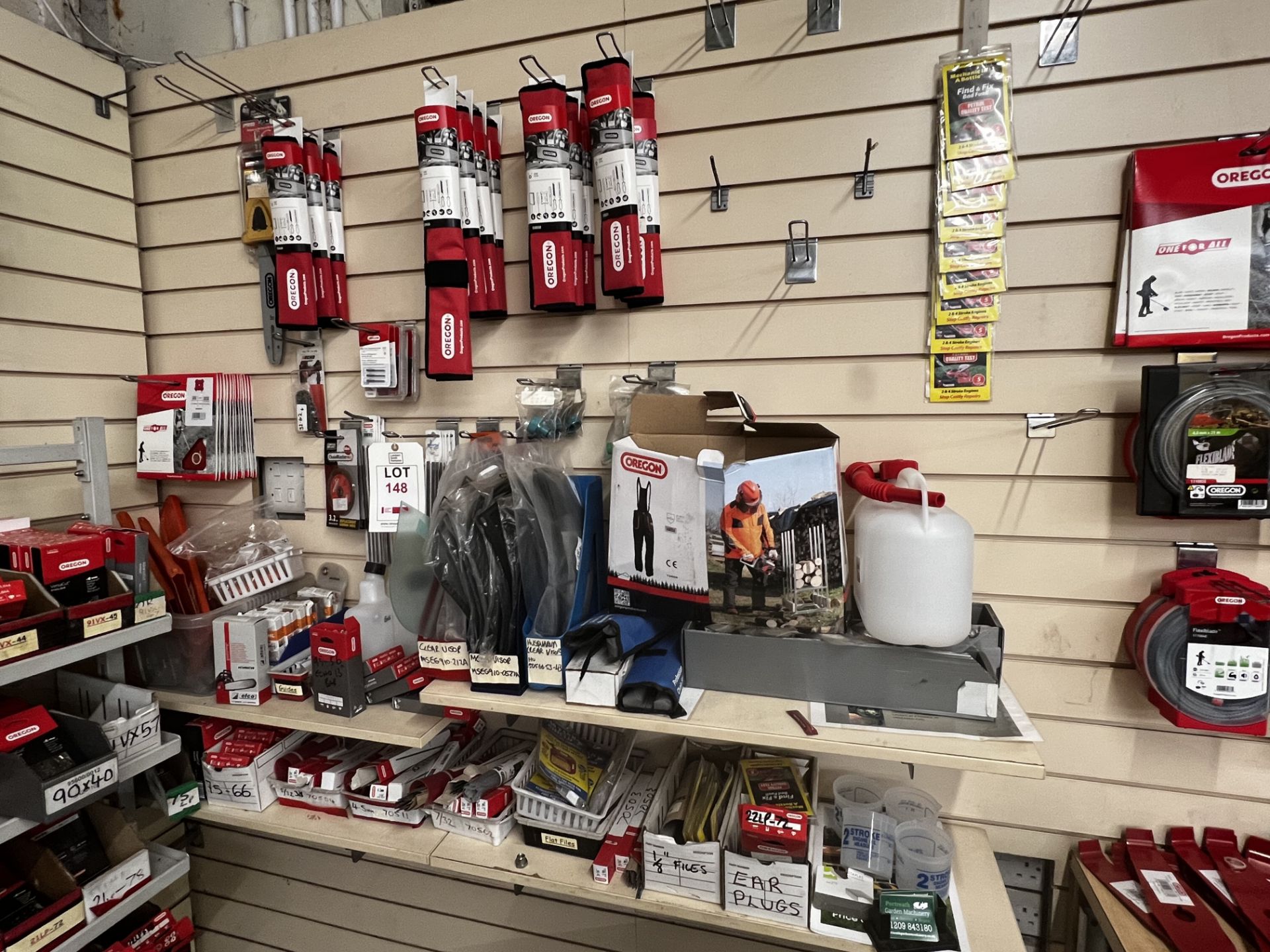 Contents to include Oregon sharpening tools, files, visors, fuel bottles (this lot is located at