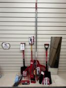 Set of Corona gardening equipment to include spade, shovel, leaf rake, pruning saw, long reach