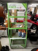 Green 4-shelf display rack, to include nine Eco 2 stroke oil bottles, height 1.68m x width 65cm x