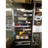 Rack including contents of fuel lines, 2-stroke, engine parts, cables, connectors etc. (this lot