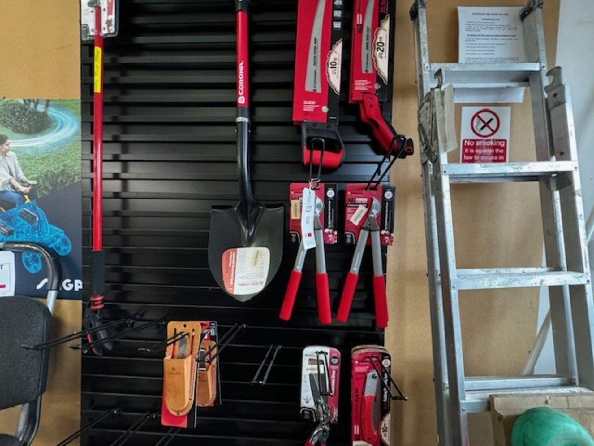 Corona display stand with contents to include pruner, spade, saws, grass shears, etc., approx height - Image 3 of 4