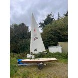 Laser dinghy (around 1980's) to include sail, trailer and cover sheet
