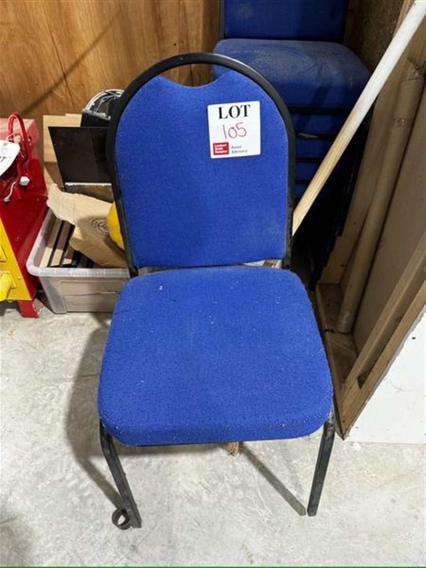 Eight blue upholstered chairs
