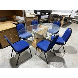 Glass oval topped table, length 1.8m x width 1.16m, with six blue upholstered chairs