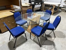 Glass oval topped table, length 1.8m x width 1.16m, with six blue upholstered chairs