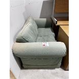 2-seater green cloth sofa