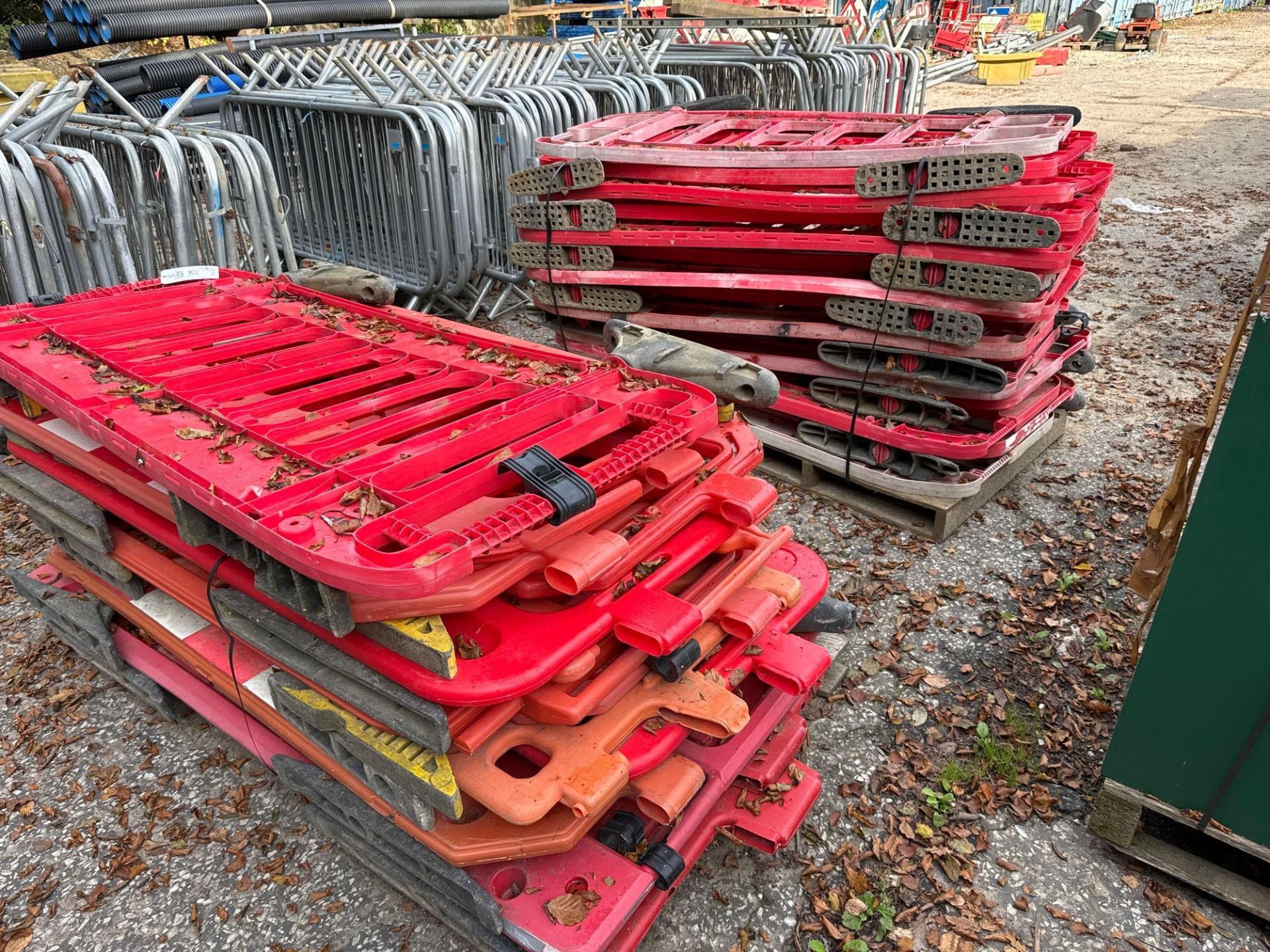 Approx 40 plastic crash barriers