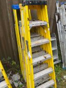 four sets of fibreglass step ladders