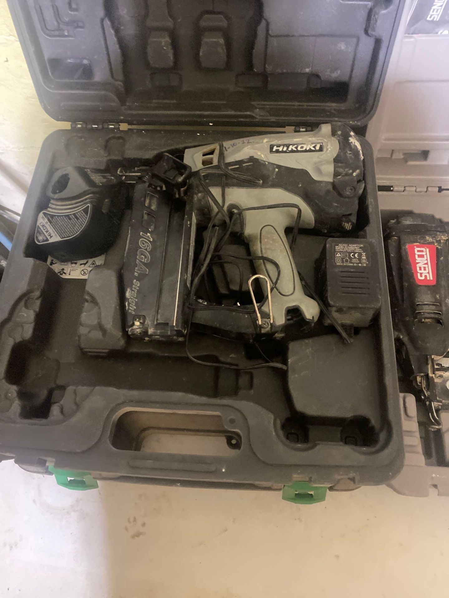 Three Hitachi NT65GS 65mm gas nail guns complete with 3 chargers and 1 battery - Image 2 of 3