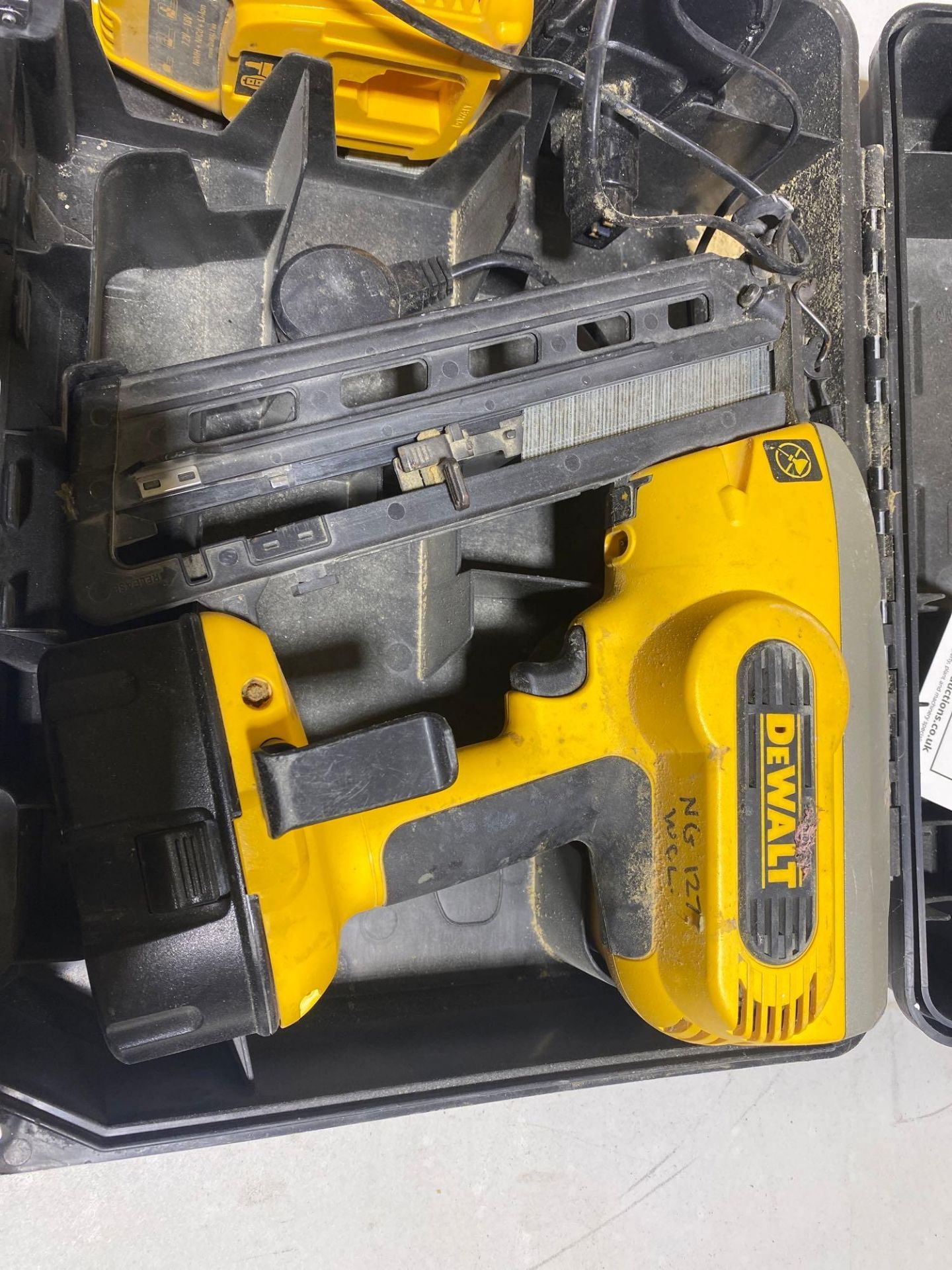 DeWALT cordless nail gun complete with charger and 2 batteries - Image 2 of 3