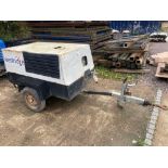 Kaser trailer mounted diesel powered air compressor, run hours 1533,