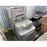 Two and a half pallets of grey permeable paving bricks