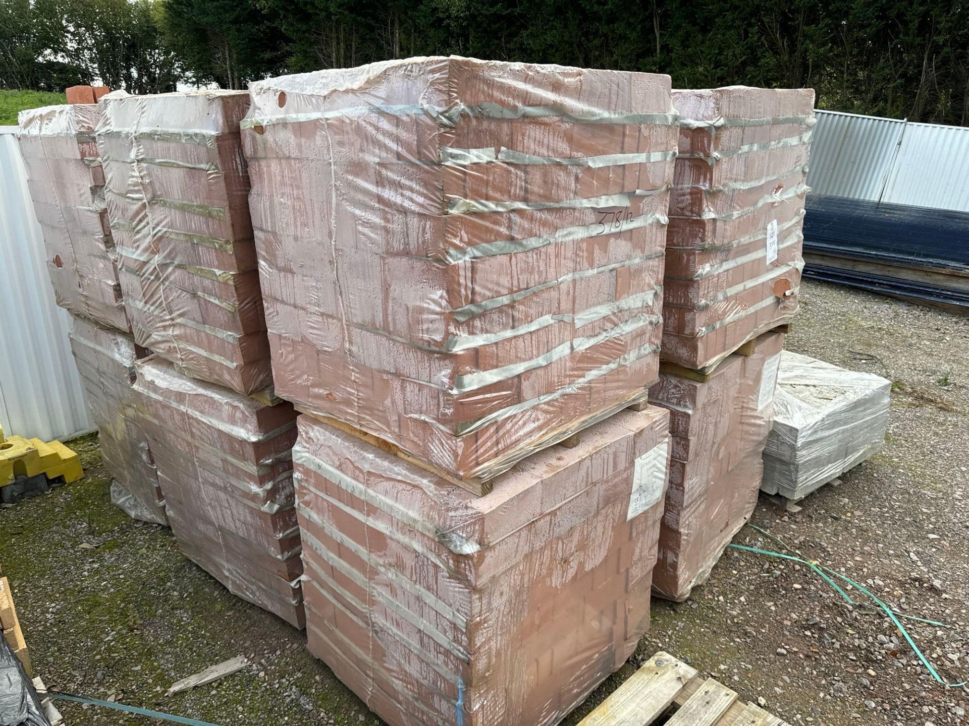 12 pallets of 215 x 102 x 65mm coral red bricks