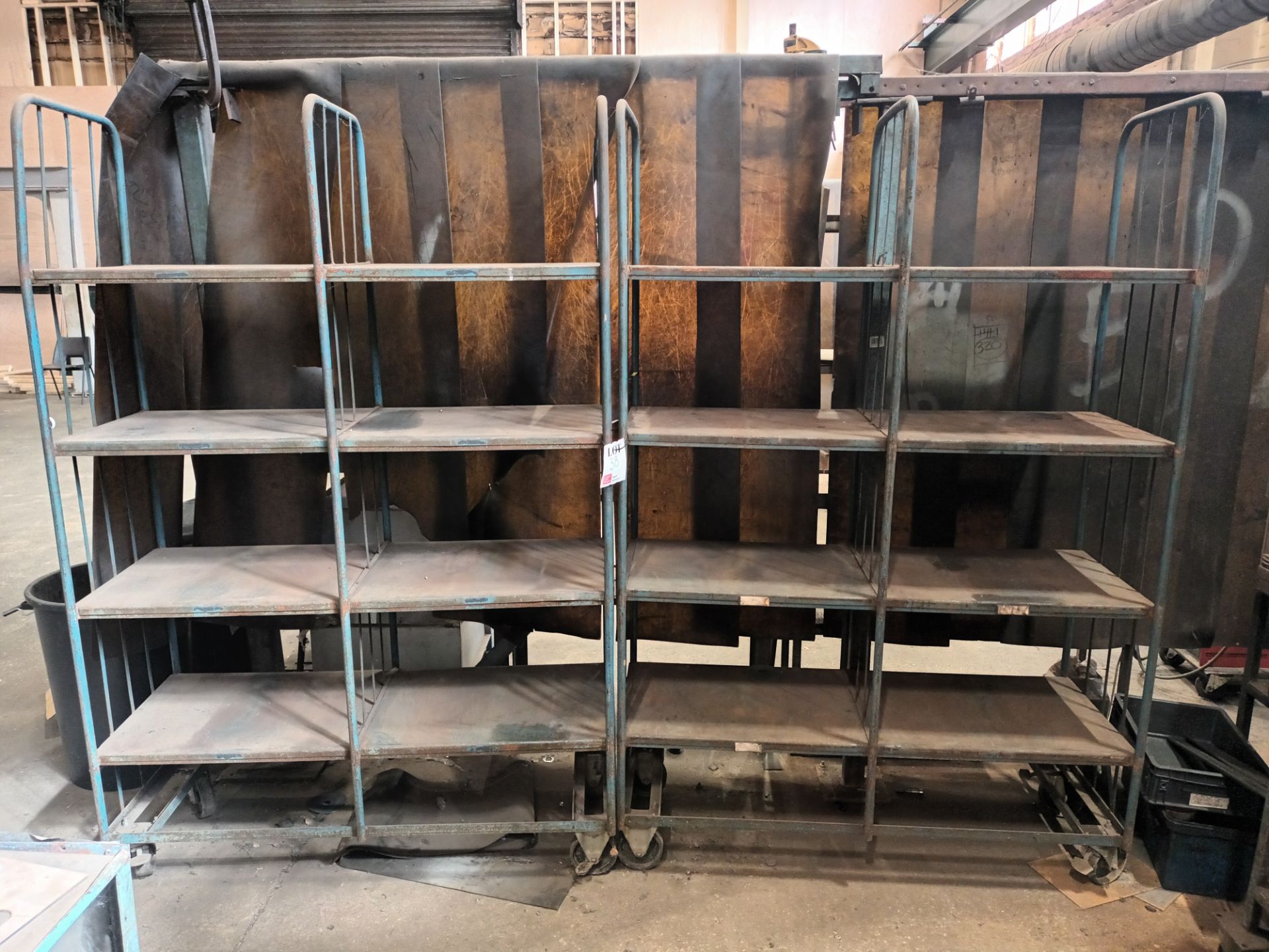 Two eight-tier metal framed rack units
