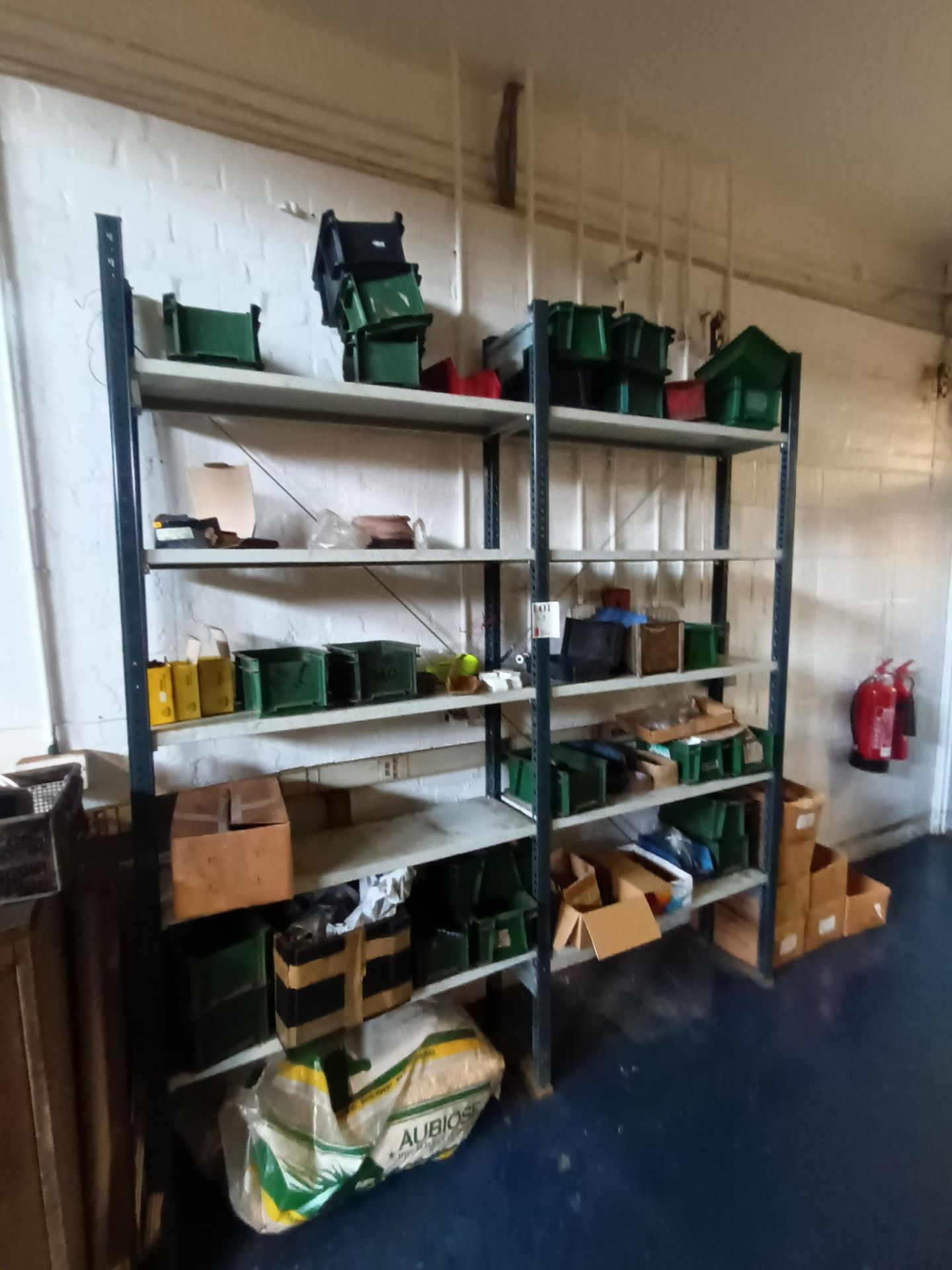 Two bays of boltless steel shelving with contents of assorted fittings