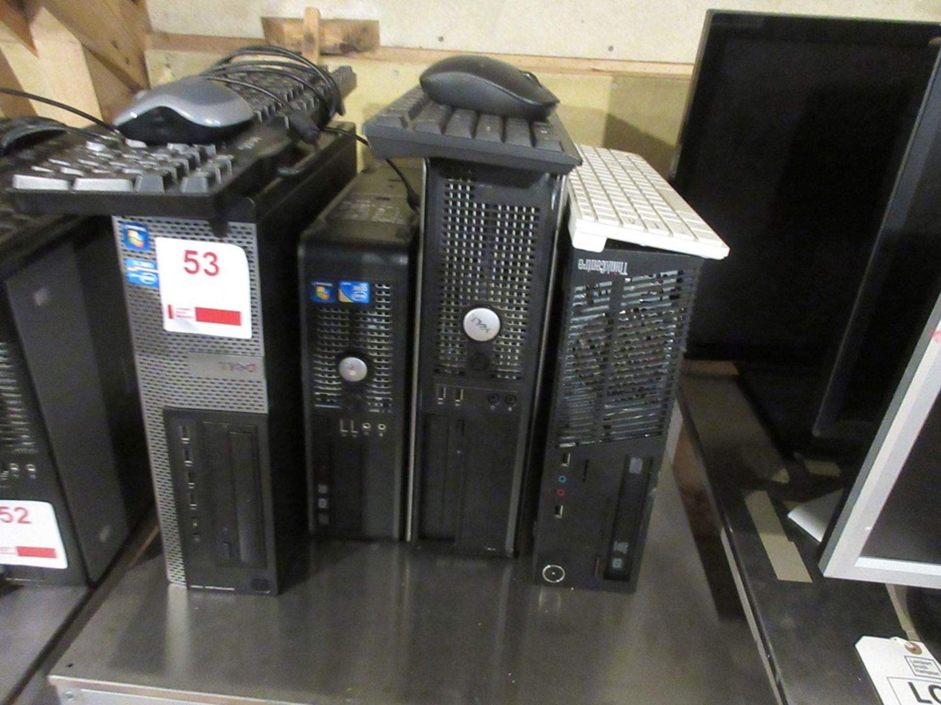 Four various computer towers, 3 x flat screen monitors, 3 x keyboards, 2 x mice