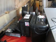 Two computer towers, 3 x flat screen monitors, 2 x keyboards, 1 x Fellowes P45-C paper shredder