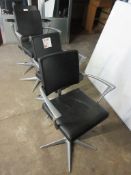 Four leatherette height adjustable swivel hairdresser chairs