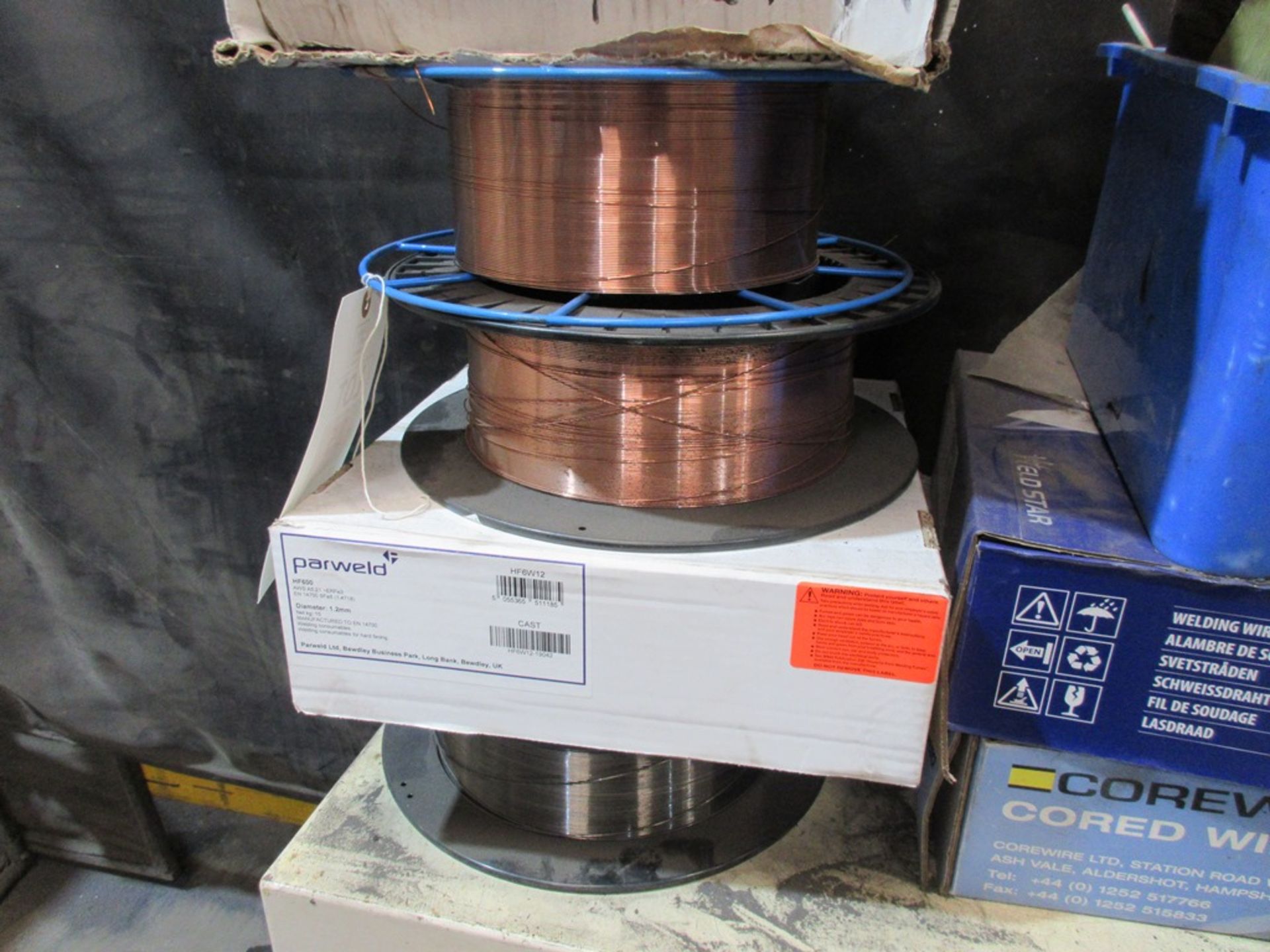 Nine assorted boxed and part used reels of welding wire, and tub of assorted welding rods - Image 5 of 7