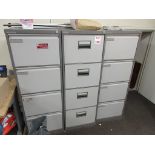 Three steel 4-drawer filing cabinets