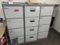 Three steel 4-drawer filing cabinets
