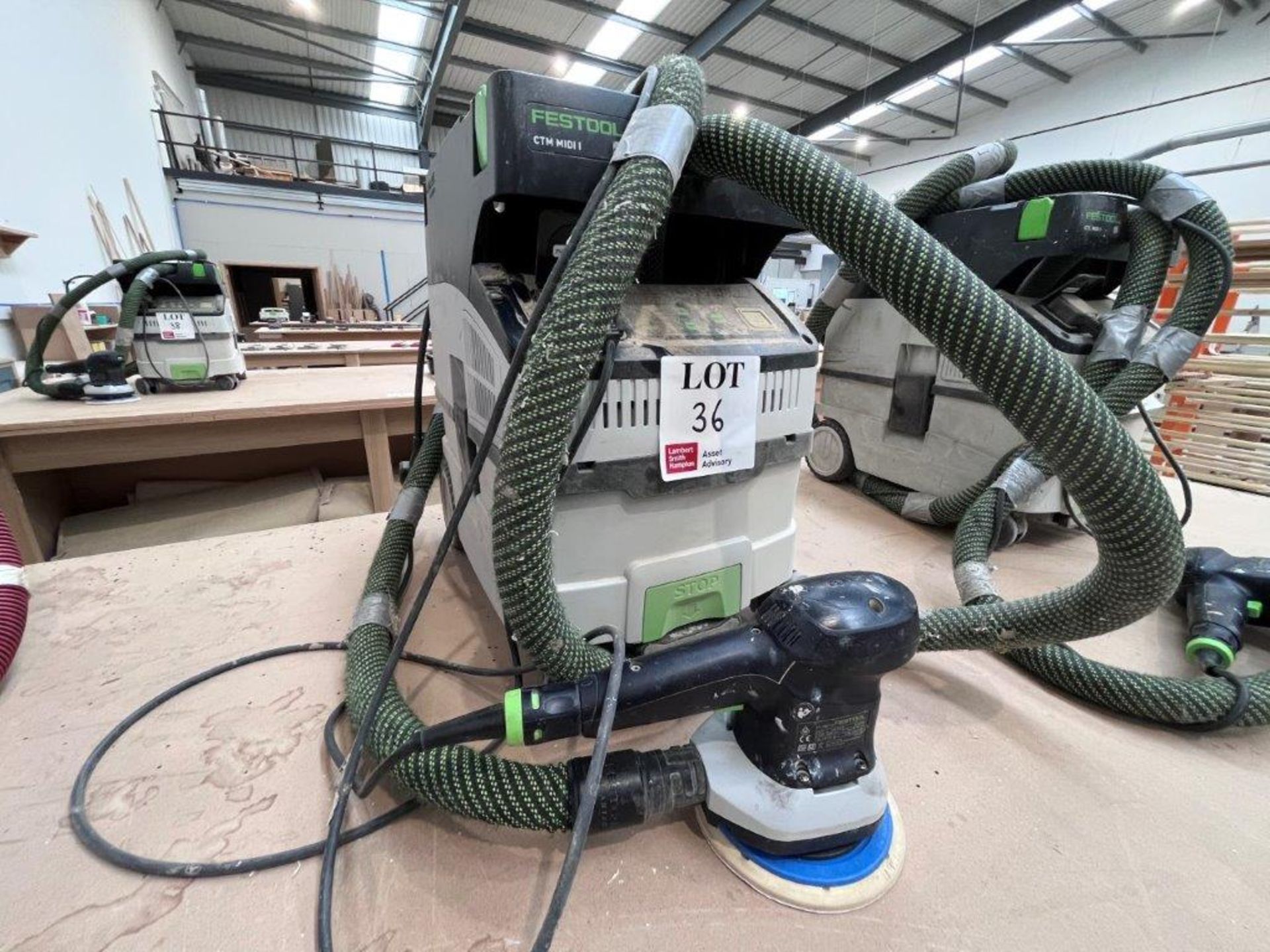 Festool CTM MIDI I dust extractor with Festool ETS 150/3 EQ orbital sander