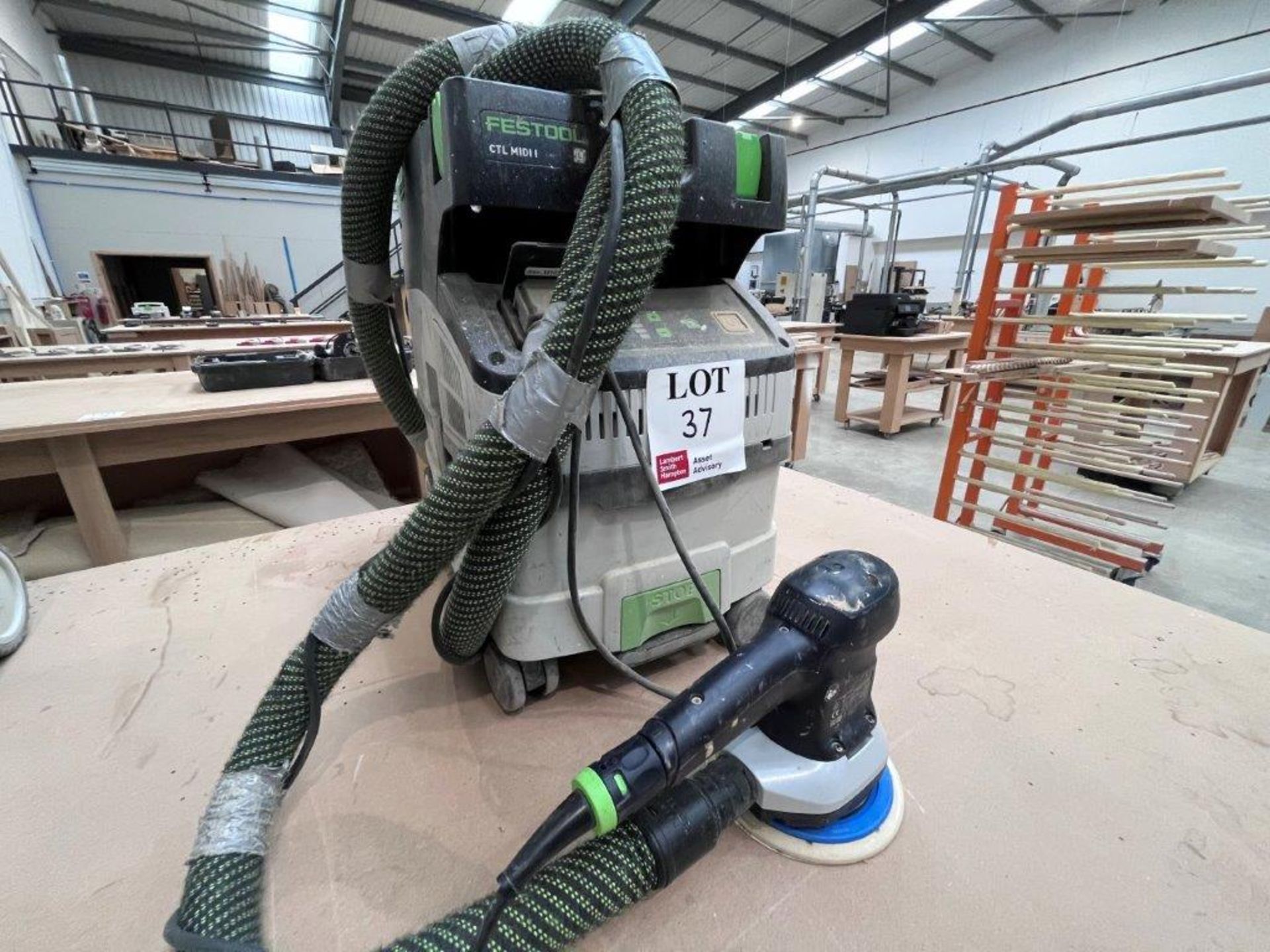 Festool CTM MIDI I dust extractor with Festool ETS 150/3 EQ orbital sander